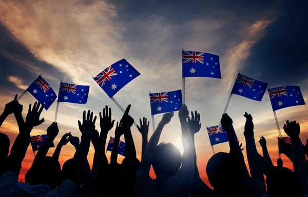 group people waving australian flags 600nw 215936266